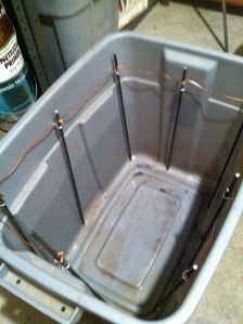 I got a plastic bin and wired up some rods in order to surround the vise.